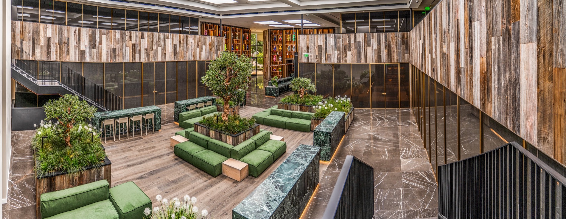 Completed commercial atrium with custom wood and stone finishes